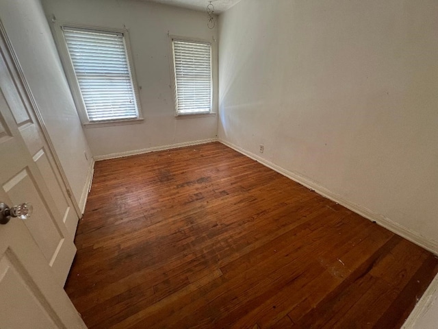 143 Brookshire Ave, Azle, TX 76020 - unfurnished room featuring wood finished floors and baseboards
