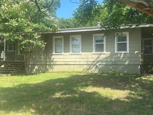 143 Brookshire Ave, Azle, TX 76020 - view of property exterior featuring a yard