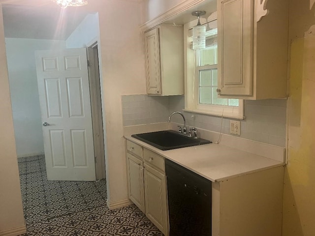 143 Brookshire Ave, Azle, TX 76020 - kitchen featuring dishwasher, a sink, backsplash, light countertops, and cream cabinetry