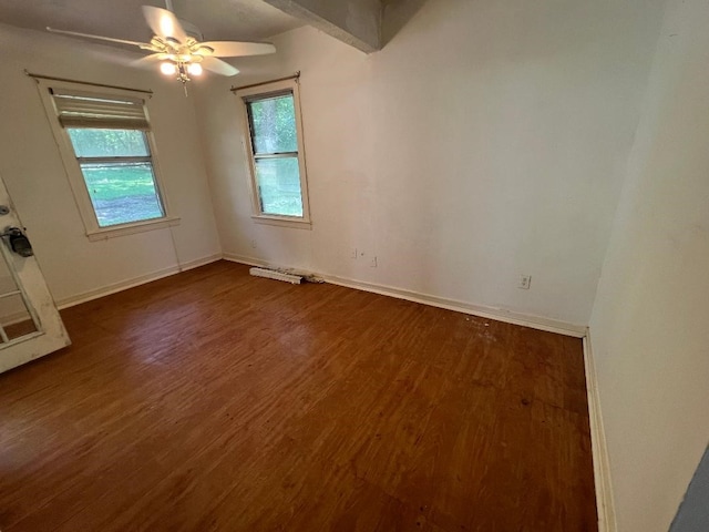 143 Brookshire Ave, Azle, TX 76020 - unfurnished room with dark wood-style flooring, ceiling fan, and baseboards