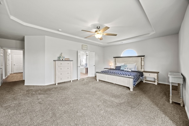 316 Cunningham Cir, Celina, TX 75009 - bedroom with a tray ceiling, carpet flooring, baseboards, and a ceiling fan