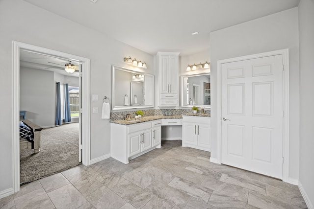 316 Cunningham Cir, Celina, TX 75009 - bathroom featuring vanity, a ceiling fan, baseboards, and ensuite bathroom