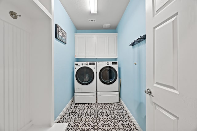 316 Cunningham Cir, Celina, TX 75009 - washroom with baseboards, washing machine and clothes dryer, and cabinet space