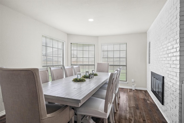 13340 Willow Springs Rd, Haslet, TX 76052 - dining room with dark wood-type flooring, baseboards, and a fireplace
