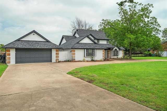 13340 Willow Springs Rd, Haslet, TX 76052 - view of front of home with a front lawn, concrete driveway, a garage, brick siding, and roof with shingles