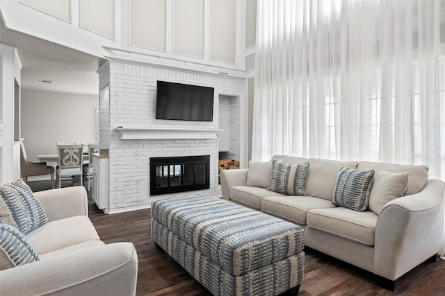 13340 Willow Springs Rd, Haslet, TX 76052 - living room featuring a fireplace, wood finished floors, and a towering ceiling