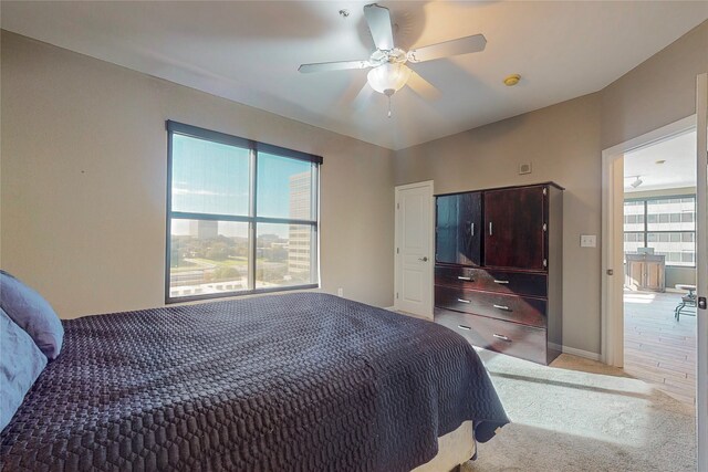 330 Las Colinas Blvd E Unit 920, Irving, TX 75039 - carpeted bedroom featuring ceiling fan