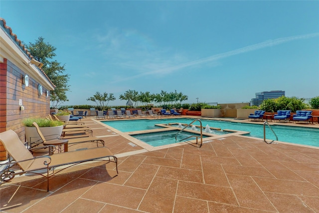 330 Las Colinas Blvd E Unit 920, Irving, TX 75039 - community pool featuring a hot tub and a patio