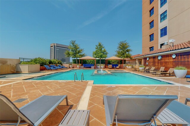 330 Las Colinas Blvd E Unit 920, Irving, TX 75039 - community pool featuring a patio