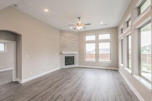 2033 Barbette St, Fort Worth, TX 76008 - unfurnished living room with a ceiling fan, plenty of natural light, wood finished floors, and recessed lighting