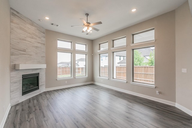2033 Barbette St, Fort Worth, TX 76008 - unfurnished living room featuring plenty of natural light, a ceiling fan, baseboards, recessed lighting, and dark wood-style floors