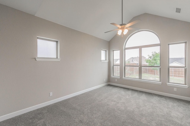 2033 Barbette St, Fort Worth, TX 76008 - empty room featuring vaulted ceiling, ceiling fan, healthy amount of natural light, carpet flooring, and baseboards