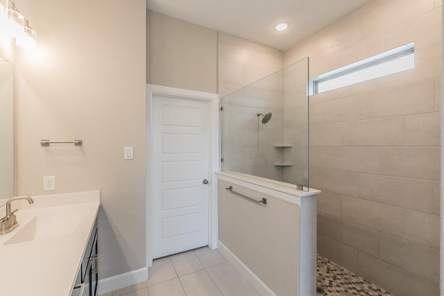 2033 Barbette St, Fort Worth, TX 76008 - full bath featuring walk in shower, vanity, tile patterned floors, and baseboards