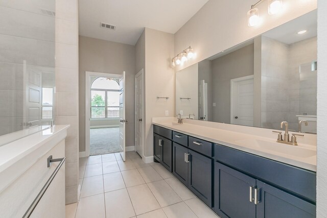 2033 Barbette St, Fort Worth, TX 76008 - full bath with double vanity, tile patterned floors, and baseboards