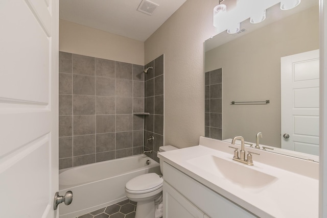 2033 Barbette St, Fort Worth, TX 76008 - full bathroom featuring vanity, toilet, bathing tub / shower combination, and tile patterned floors