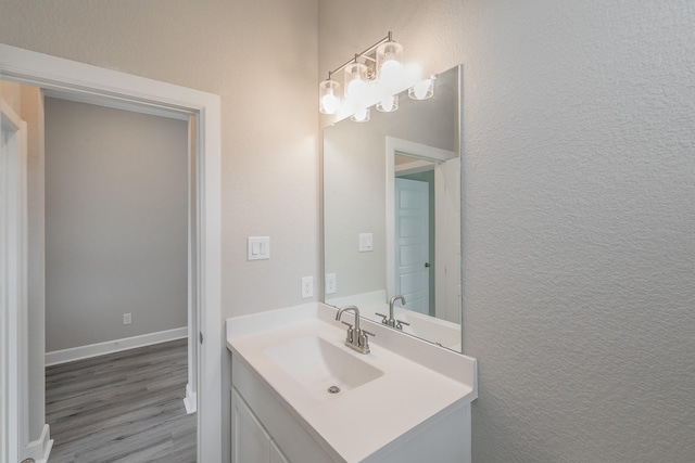 2033 Barbette St, Fort Worth, TX 76008 - bathroom with vanity and wood finished floors