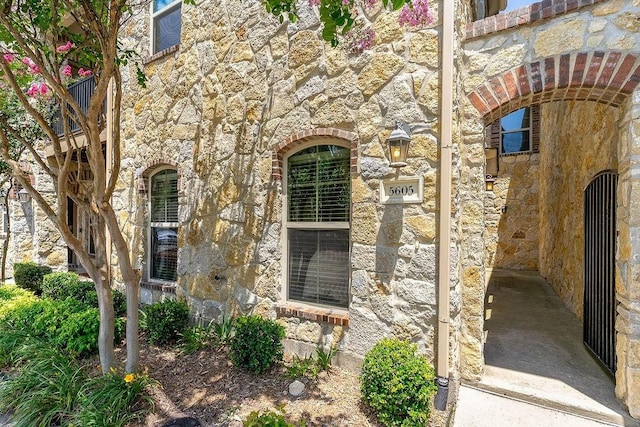 5605 Cojimar Dr, Mckinney, TX 75070 - doorway to property featuring stone siding