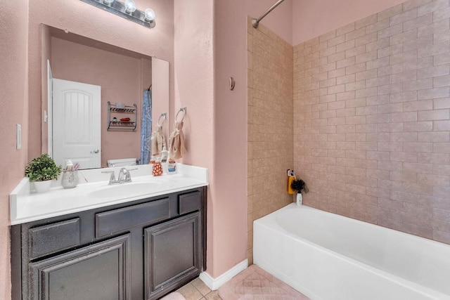 5605 Cojimar Dr, Mckinney, TX 75070 - full bath featuring vanity, washtub / shower combination, and tile patterned floors
