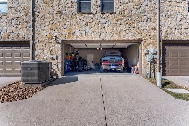 5605 Cojimar Dr, Mckinney, TX 75070 - garage with central AC and concrete driveway