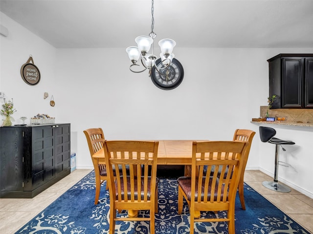 5605 Cojimar Dr, Mckinney, TX 75070 - dining space with a chandelier, light tile patterned floors, and baseboards