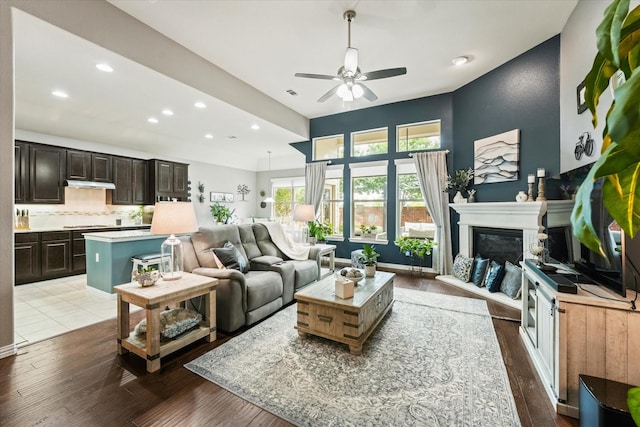 11521 Misty Mesa Dr, Fort Worth, TX 76052 - living area featuring ceiling fan, recessed lighting, hardwood / wood-style floors, and a glass covered fireplace