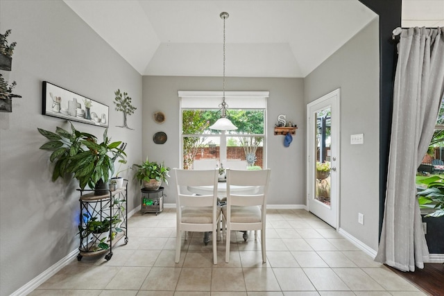 11521 Misty Mesa Dr, Fort Worth, TX 76052 - dining room with vaulted ceiling, light tile patterned floors, and baseboards