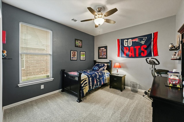 11521 Misty Mesa Dr, Fort Worth, TX 76052 - carpeted bedroom with baseboards and a ceiling fan