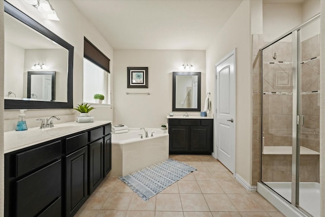 11521 Misty Mesa Dr, Fort Worth, TX 76052 - bathroom featuring a stall shower, a bath, tile patterned flooring, and two vanities