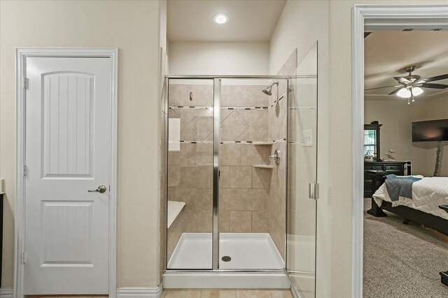 11521 Misty Mesa Dr, Fort Worth, TX 76052 - full bathroom featuring connected bathroom, a ceiling fan, a stall shower, and recessed lighting