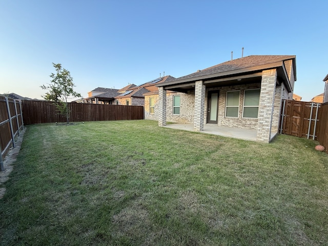 3681 Keechi Creek Dr, Celina, TX 75078 - back of house featuring a patio area and a shingled roof