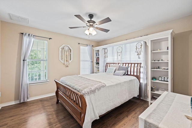 720 Aqua Vista Dr, Granbury, TX 76049 - bedroom featuring dark wood-type flooring, baseboards, and a ceiling fan
