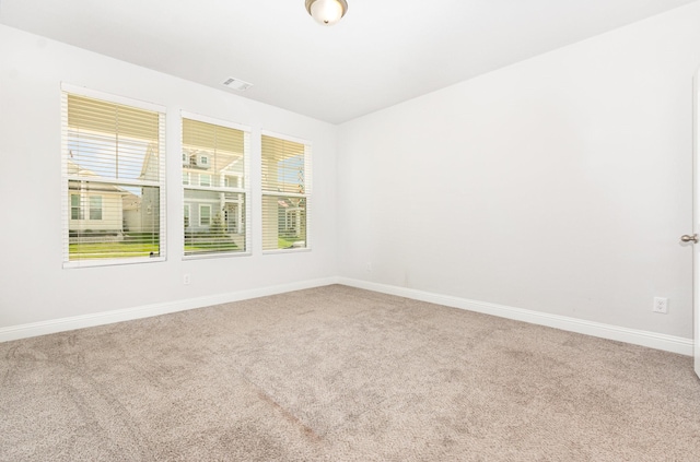 8409 Alba Ln, Rowlett, TX 75089 - empty room with carpet floors and baseboards