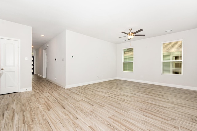 8409 Alba Ln, Rowlett, TX 75089 - empty room featuring light wood-style floors, ceiling fan, baseboards, and recessed lighting