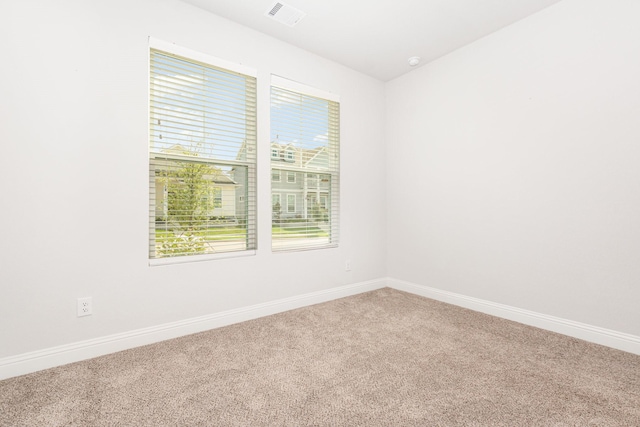 8409 Alba Ln, Rowlett, TX 75089 - carpeted spare room with baseboards