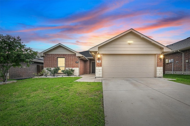 14235 Greenhaw Ln, Dallas, TX 75253 - ranch-style home with driveway, brick siding, an attached garage, and a front lawn