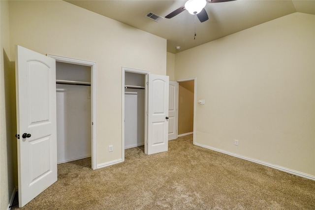 144 Brady Coleman Ln, Springtown, TX 76082 - unfurnished bedroom featuring multiple closets, carpet floors, vaulted ceiling, a ceiling fan, and baseboards