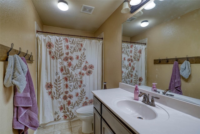 144 Brady Coleman Ln, Springtown, TX 76082 - bathroom featuring toilet, vanity, tile patterned flooring, a textured wall, and a shower with curtain