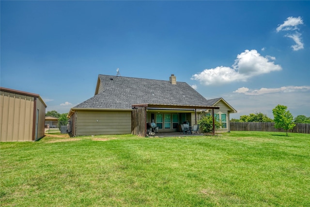 144 Brady Coleman Ln, Springtown, TX 76082 - back of property with a patio, a chimney, and roof with shingles