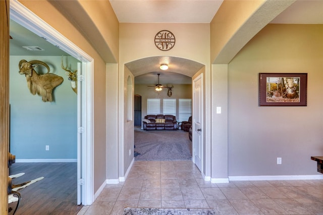 144 Brady Coleman Ln, Springtown, TX 76082 - hall featuring arched walkways and baseboards