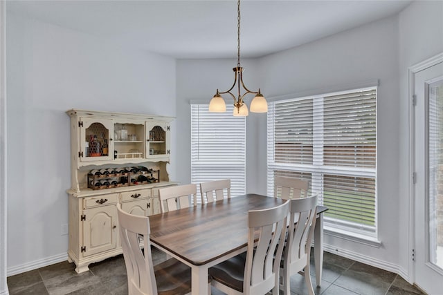 566 Long Meadow Dr, Haslet, TX 76052 - dining space with a chandelier and dark tile patterned floors