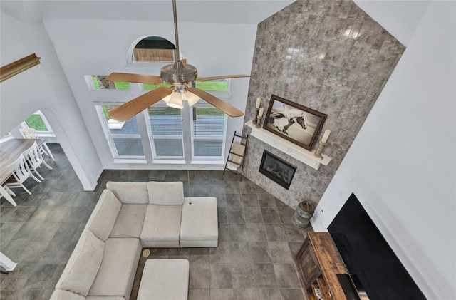 566 Long Meadow Dr, Haslet, TX 76052 - living area featuring a large fireplace and a ceiling fan