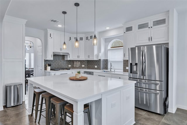 566 Long Meadow Dr, Haslet, TX 76052 - kitchen with stainless steel appliances, white cabinetry, tasteful backsplash, and recessed lighting