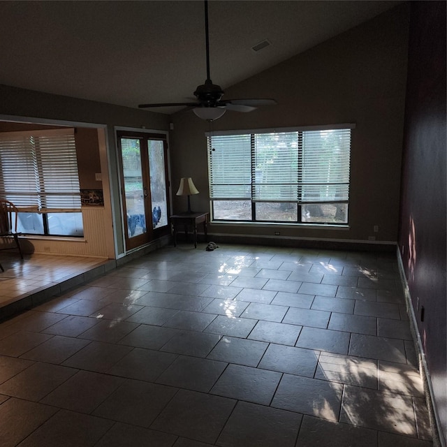 4515 Indian Oaks Trl, Arlington, TX 76017 - spare room featuring french doors, a ceiling fan, vaulted ceiling, and baseboards