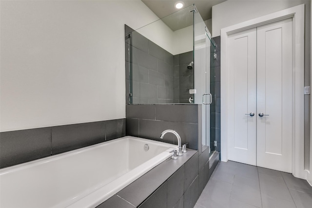 3816 Roseland Ave Unit C200, Dallas, TX 75204 - full bath featuring a garden tub, a stall shower, tile patterned flooring, and recessed lighting