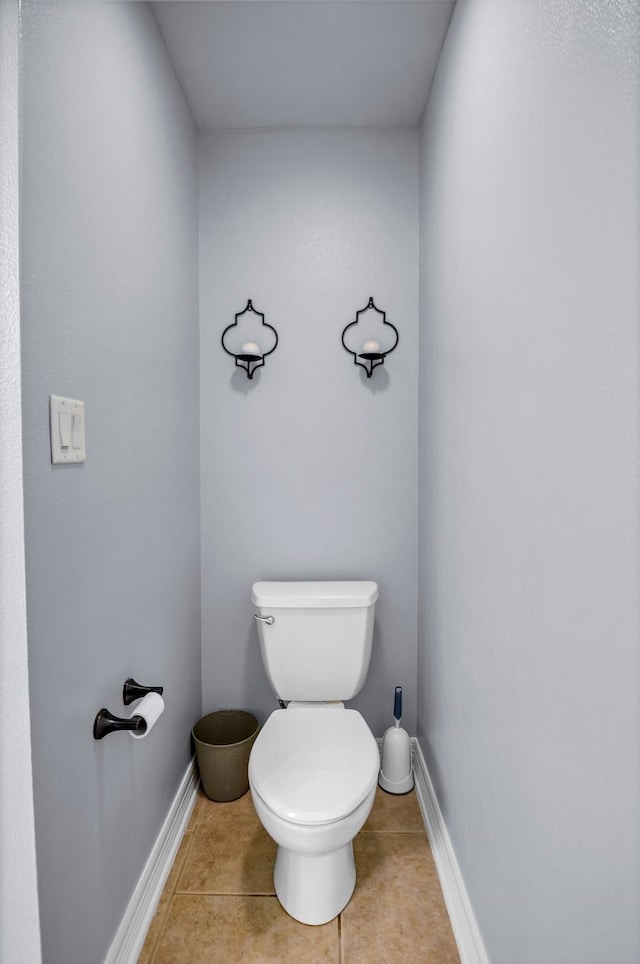229 Maggie Cir, Flint, TX 75762 - bathroom featuring toilet, baseboards, and tile patterned floors