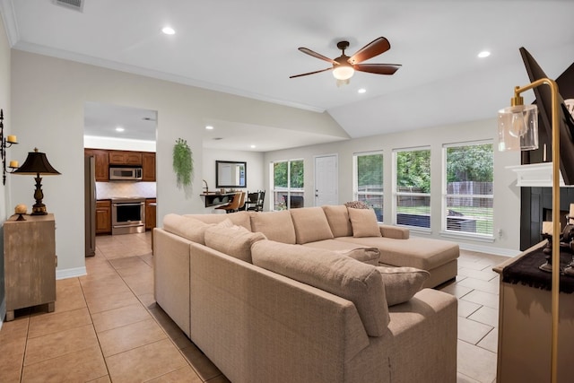 229 Maggie Cir, Flint, TX 75762 - living room featuring light tile patterned flooring, ceiling fan, recessed lighting, a tile fireplace, and baseboards