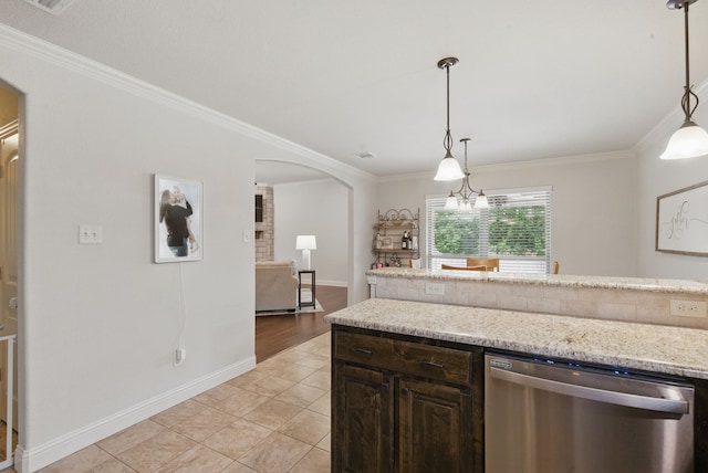 616 Zachary Dr, Weatherford, TX 76087 - kitchen featuring stainless steel dishwasher, arched walkways, ornamental molding, baseboards, and dark brown cabinetry