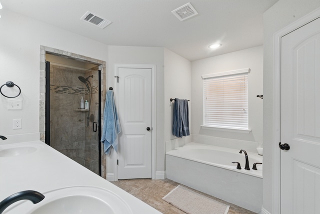616 Zachary Dr, Weatherford, TX 76087 - full bathroom featuring a garden tub, a shower stall, double vanity, tile patterned floors, and recessed lighting