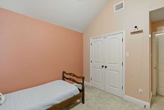 616 Zachary Dr, Weatherford, TX 76087 - bedroom featuring light carpet, baseboards, vaulted ceiling, and a closet