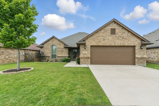 616 Zachary Dr, Weatherford, TX 76087 - view of front facade featuring brick siding, a garage, driveway, and roof with shingles